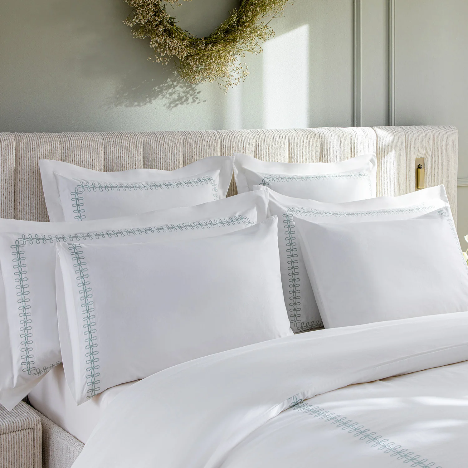 Milano Sea Spray Green Knot Embroidered 600 Thread Count Cotton Sateen Regular Pillowcases - Pair - Image 2
