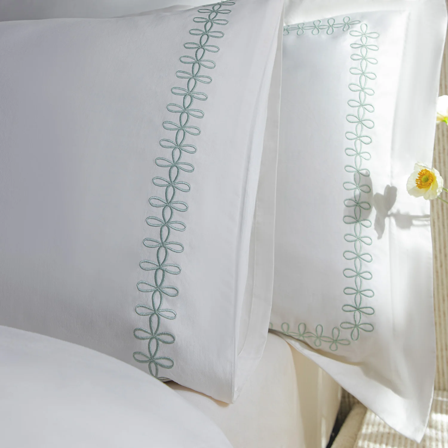 Milano Sea Spray Green Knot Embroidered 600 Thread Count Cotton Sateen Regular Pillowcases - Pair - Image 3