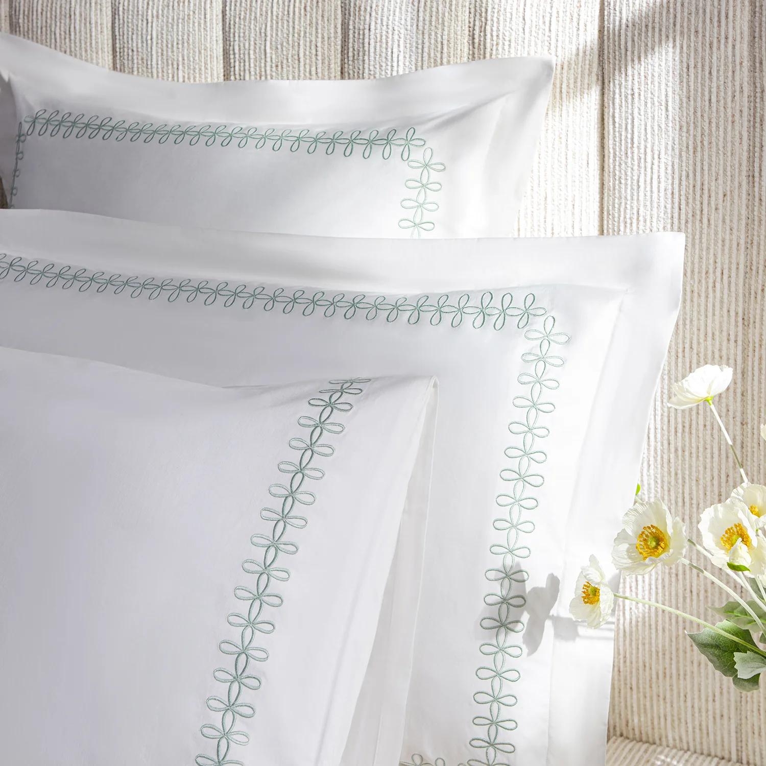 Milano Sea Spray Green Knot Embroidered 600 Thread Count Cotton Sateen Regular Pillowcases - Pair - Image 4